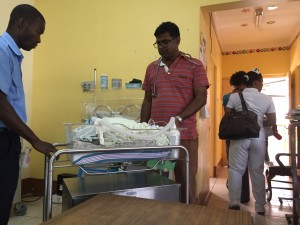 Dr Ravi working on patient transfer to Bustamante Children's Hospital